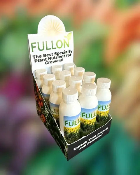 Display of Fullon plant nutrient bottles in display box with a colorful blurred background